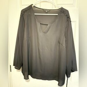 Adorable black top with great sleeve detail!